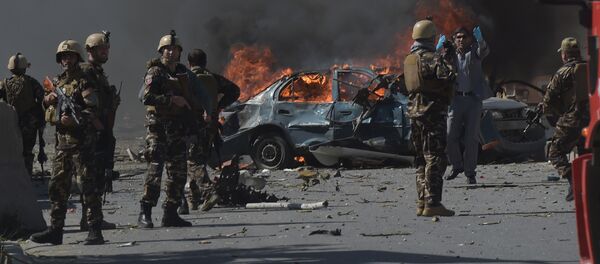 Персонал афганских сил безопасности на месте нападения террористов в Кабуле, архивное фото Персонал афганских сил безопасности на месте нападения террористов в Кабуле, архивное фото - Sputnik Казахстан