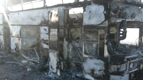 Сгоревший в Ыргызском районе автобус - Sputnik Казахстан