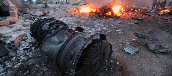 Обломки сбитого Су-25 Обломки сбитого Су-25 - Sputnik Казахстан