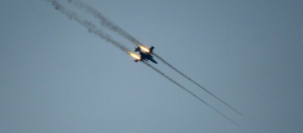 Самолет-штурмовик Су-25 в небе, архивное фото Самолет-штурмовик Су-25 в небе, архивное фото - Sputnik Казахстан