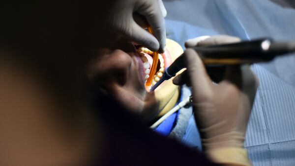 Пациент на приеме у стоматолога - Sputnik Казахстан