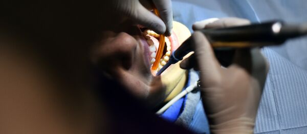 Пациент на приеме у стоматолога - Sputnik Казахстан