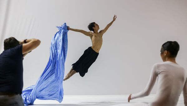 Фотограф Алексей Кривцов за работой в Astana Ballet - Sputnik Казахстан