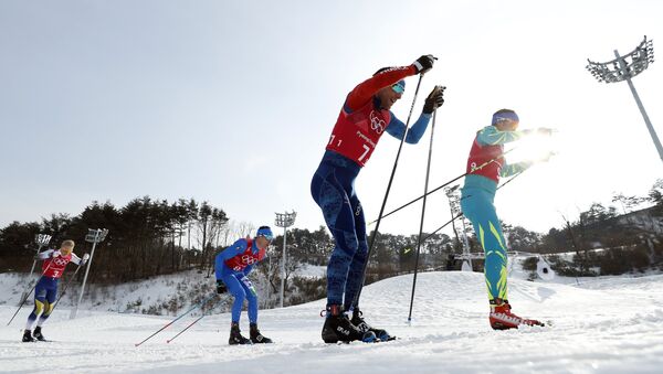 Алексей Полторанин во время соревнований по лыжным гонкам в Пхенчхане, 24 февраля 2018 - Sputnik Казахстан