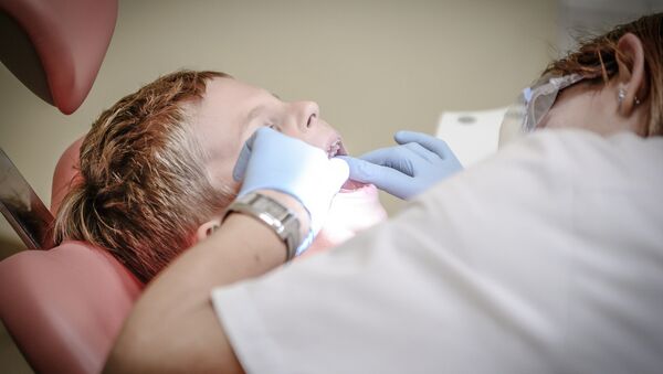Ребенок на приему у стоматолога, архивное фото - Sputnik Казахстан