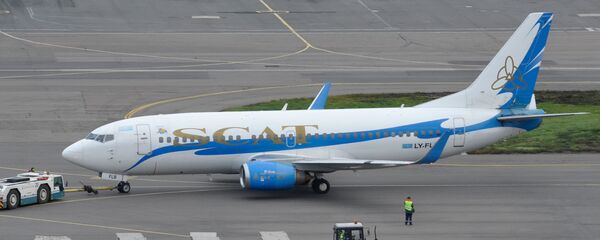 Пассажирский самолет казахстанской авиакомпании SCAT (СКАТ) в аэропорту, архивное фото Пассажирский самолет казахстанской авиакомпании SCAT (СКАТ) в аэропорту, архивное фото - Sputnik Казахстан