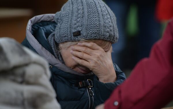 Родственница одного из пропавших без вести при пожаре в торговом центре «Зимняя вишня» в Кемерово - Sputnik Казахстан