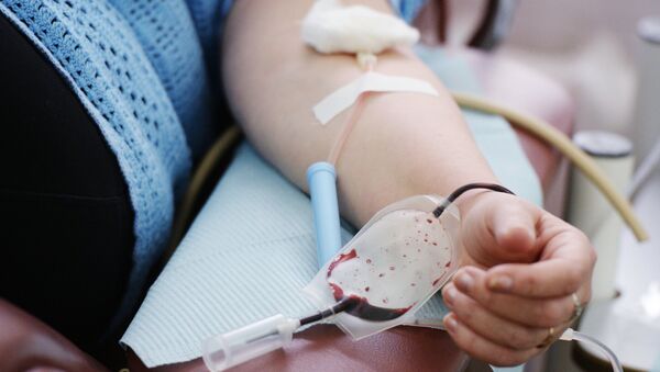 Сдача крови для пострадавших при пожаре в ТЦ Зимняя вишня  - Sputnik Казахстан