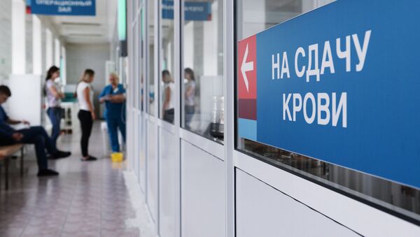 Сдача крови для пострадавших при пожаре в ТЦ Зимняя вишня - Sputnik Казахстан