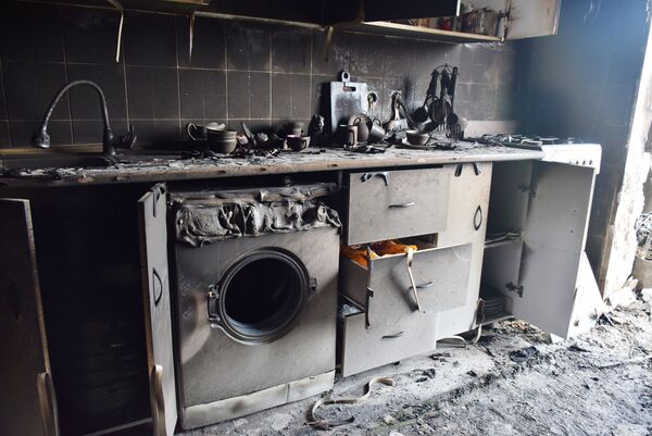 Квартиры после пожара в алматинском микрорайоне Кок Жиек Квартиры после пожара в алматинском микрорайоне Кок Жиек - Sputnik Казахстан