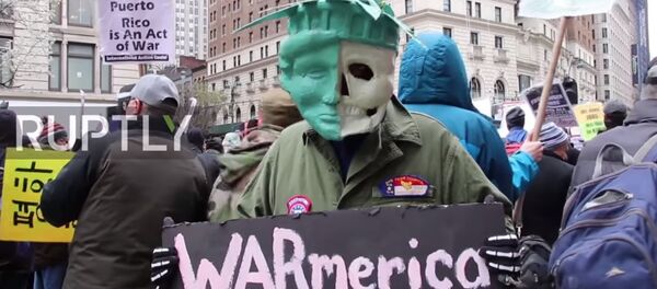 Протесты против ракетных ударов США по Сирии в Нью-Йорке Протесты против ракетных ударов США по Сирии в Нью-Йорке - Sputnik Казахстан