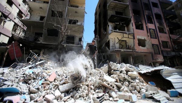 Разрушенные дома в сирийской Думе - Sputnik Казахстан