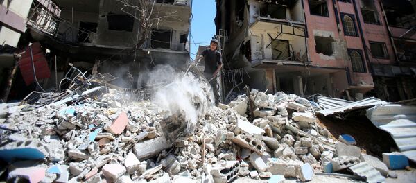 Разрушенные дома в сирийской Думе - Sputnik Казахстан