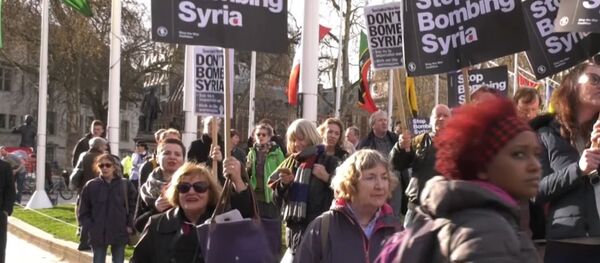 В Великобритании и США прошли протесты против ударов по Сирии - Sputnik Казахстан