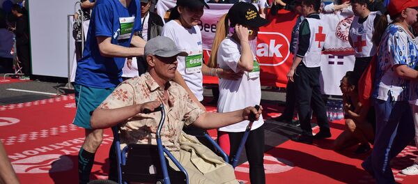 Иван Лунин пересекает финишную черту Иван Лунин пересекает финишную черту - Sputnik Казахстан