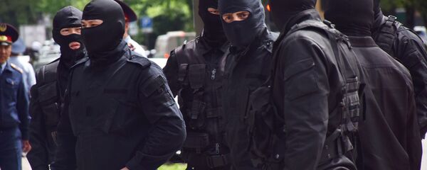 Сотрудники службы безопасности, архивное фото Сотрудники службы безопасности, архивное фото - Sputnik Казахстан