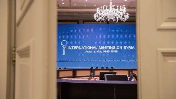 Переговоры в рамках Астанинского процесса по Сирии с участием делегаций стран-гарантов , зал заседаний - Sputnik Казахстан