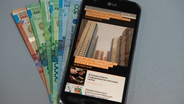 Сотовый телефон и деньги - Sputnik Казахстан