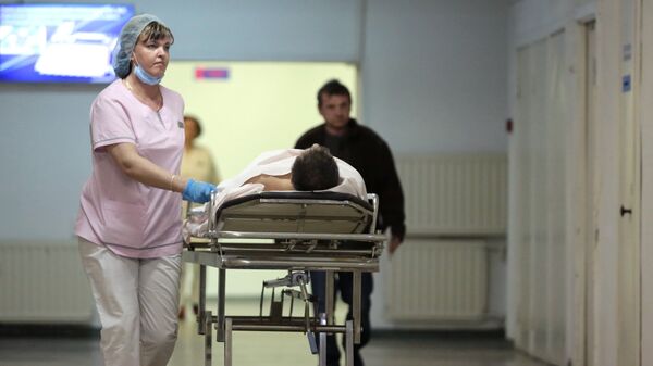 Госпитализация пациента, архивное фото - Sputnik Казахстан