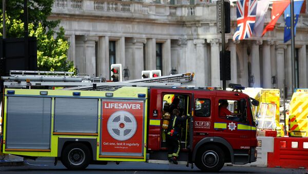 Пожарные рядом с загоревшейся гостиницей в центре Лондона - Sputnik Казахстан