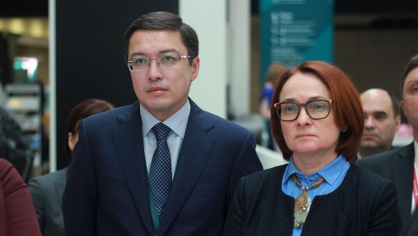 Данияр Акишев и Эльвира Набиуллина - Sputnik Казахстан