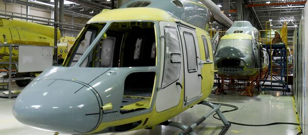 Линия сборки на вертолетном заводе, архивное фото Линия сборки на вертолетном заводе, архивное фото - Sputnik Казахстан