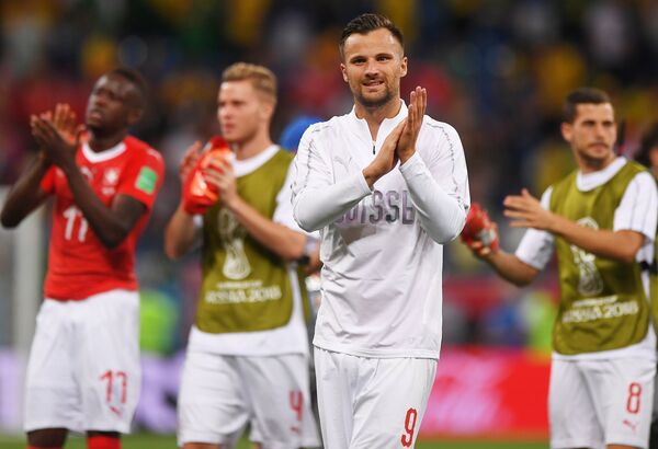 Футболисты Швейцарии после матча с Бразилией на ЧМ-2018 - Sputnik Казахстан