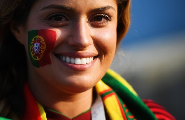 Болельщица сборной Португалии перед матчем группового этапа чемпионата мира по футболу между сборными Португалии и Испании. - Sputnik Казахстан