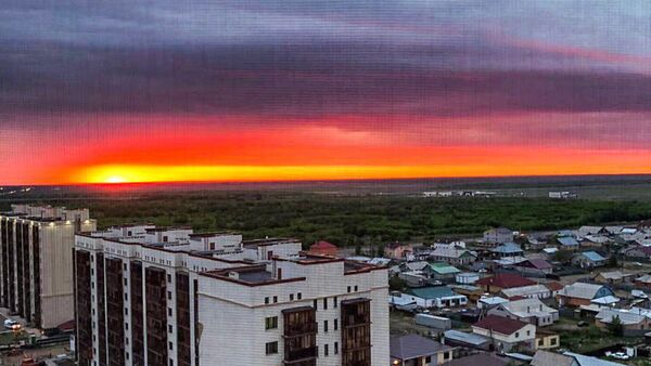 Живописный алый закат в Астане - Sputnik Казахстан