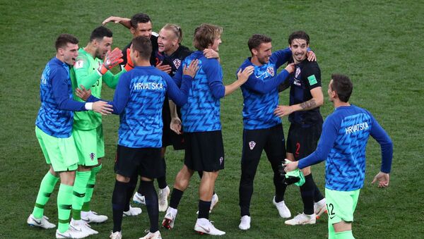 Игроки сборной Хорватии радуются победе в матче группового этапа чемпионата мира по футболу между сборными Аргентины и Хорватии - Sputnik Казахстан