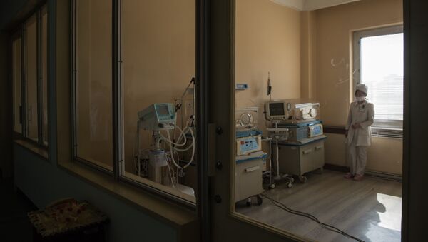 Медсестра в китайской больнице, архивное фото - Sputnik Казахстан
