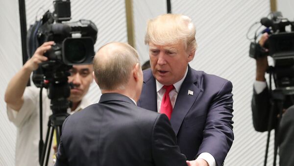 Президент РФ Владимир Путин и президент США Дональд Трамп (справа), архивное фото - Sputnik Казахстан