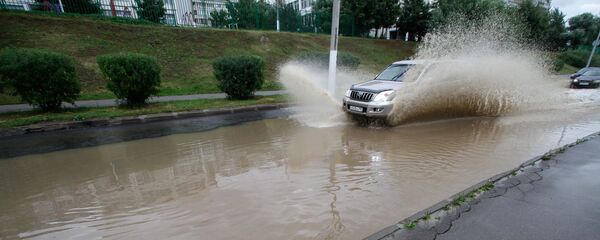 Последствия ливня, архивное фото Последствия ливня, архивное фото - Sputnik Казахстан