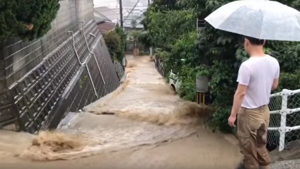 Ливни в Японии привели к наводнениям - Sputnik Казахстан