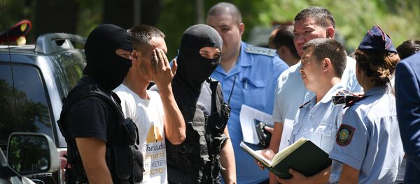 Подозреваемый в убийстве Дениса Тена на месте преступления, архивное фото - Sputnik Казахстан