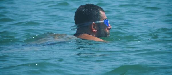 Паралимпиец Давид Гиоргобиани стал первым человеком с ОВЗ, переплывшим Тбилисское море - Sputnik Казахстан