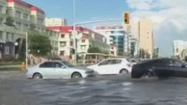 Улицы Астаны затопило после ливня - Sputnik Казахстан