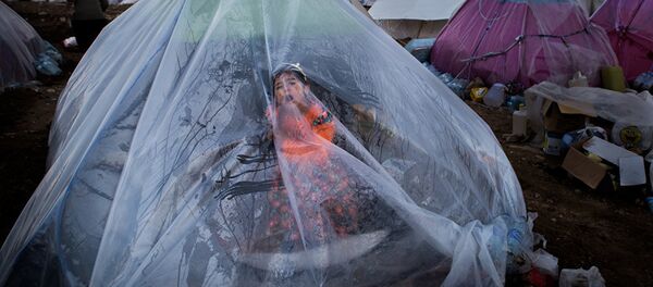 Юнес Хани Соми Софлаи, Иран. …А жизнь продолжается, номинация Главные новости, серии, 2 место и специальный приз Международного Комитета Красного Креста (МККК) За гуманитарную фотографию - Sputnik Казахстан