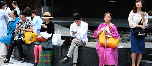 Япония, на одной из улиц Токио. - Sputnik Казахстан