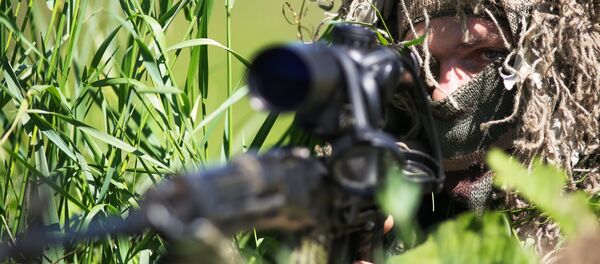 Снайпер во время учений, архивное фото Снайпер во время учений, архивное фото - Sputnik Казахстан