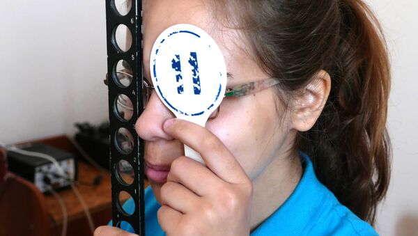 Девушка на приеме у офтальмолога, архивное фото - Sputnik Казахстан
