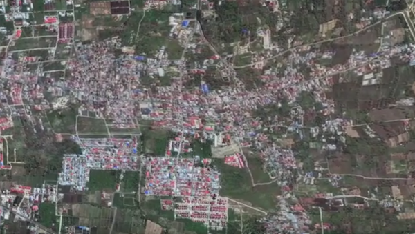 Грязевой поток смыл с лица земли два района в Индонезии - видео из космоса - Sputnik Казахстан