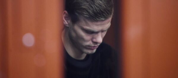 Футболист Александр Кокорин, обвиняемый в хулиганстве, на заседании Тверского районного суда Москвы Футболист Александр Кокорин, обвиняемый в хулиганстве, на заседании Тверского районного суда Москвы - Sputnik Казахстан