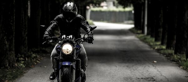 Байкер, архивное фото Байкер, архивное фото - Sputnik Казахстан