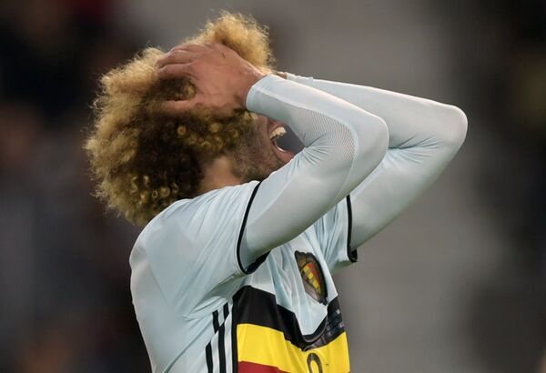 Игрок сборной Бельгии Маруан Феллайни Игрок сборной Бельгии Маруан Феллайни - Sputnik Казахстан