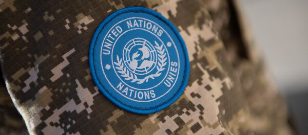 Шевроны голубого цвета с символикой ООН Шевроны голубого цвета с символикой ООН - Sputnik Казахстан