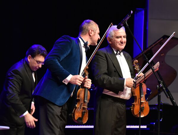 Всемирно известный музыкант, искусствовед, писатель, педагог и просветитель Михаил Казиник - Sputnik Казахстан