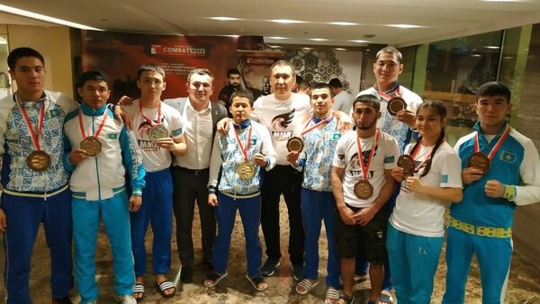 Бойцы национальной федерации ММА и панкратиона завоевали 9 медалей: 1 золотую, 1 серебряную и 7 бронзовых. Чемпионат мира по MMA прошел в Бахрейне - Sputnik Казахстан