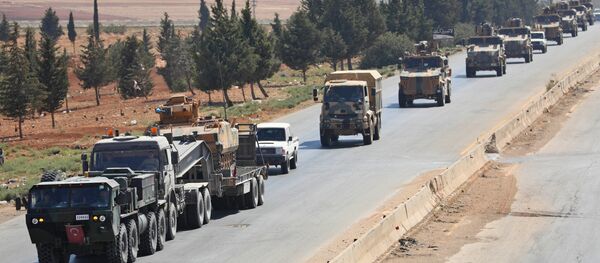 Колонна турецкой техники на границе с Сирией, архивное фото Колонна турецкой техники на границе с Сирией, архивное фото - Sputnik Казахстан