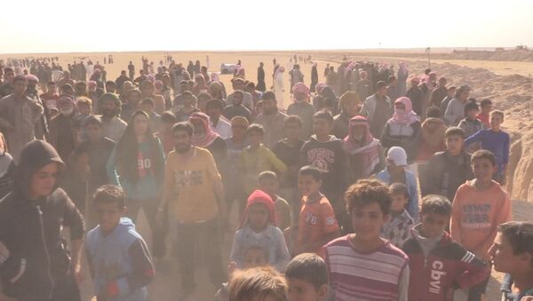 Беженцы из Мосула после начала операции против ИГ вышли к границе с Сирией - Sputnik Казахстан